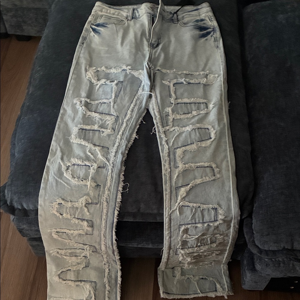 Distressed Light Blue Jeans